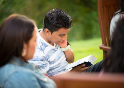 Young Man reading scriptures